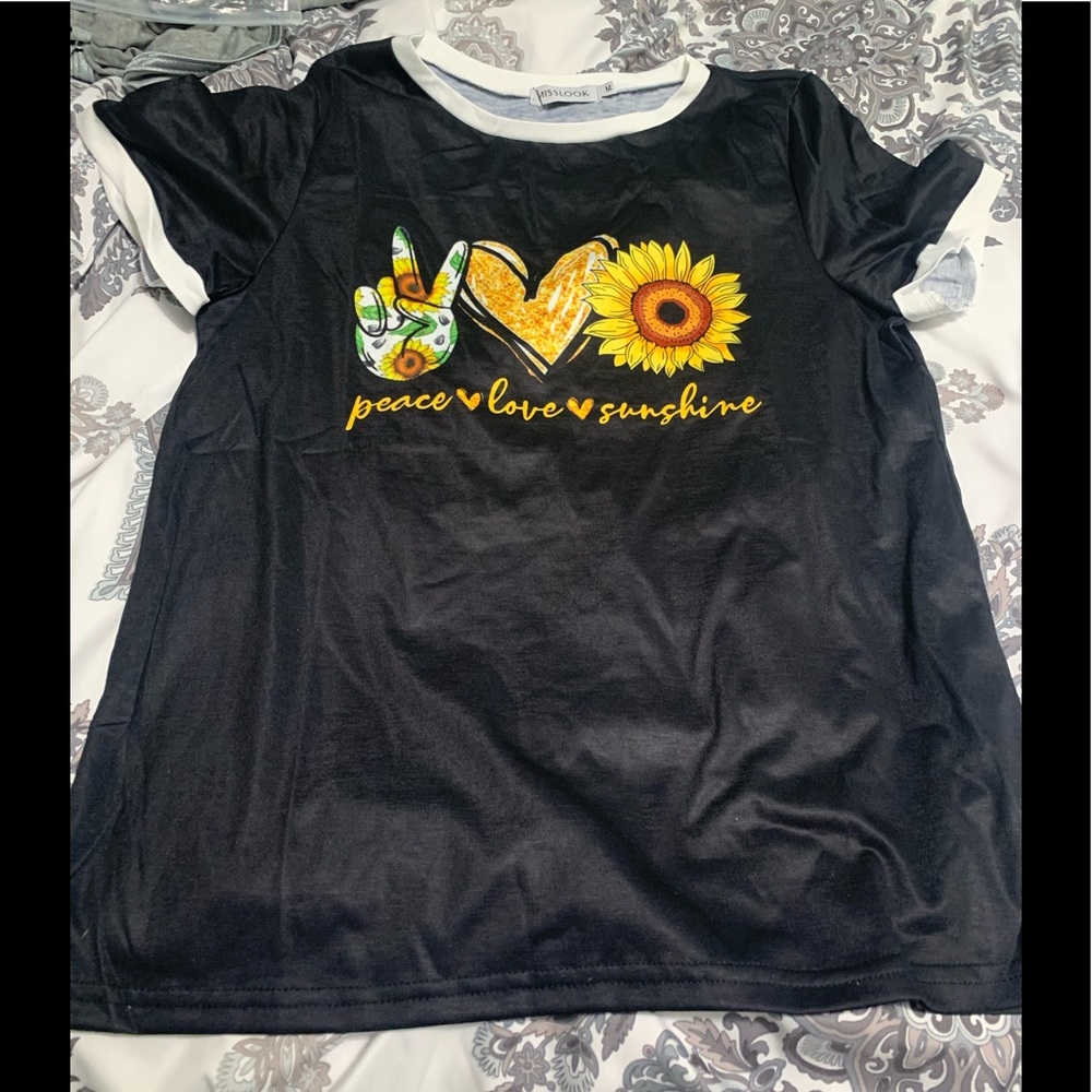 Brand new Women’s short sleeve tee.  Size M.